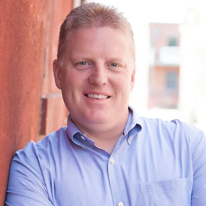 Steve Conway in a blue shirt